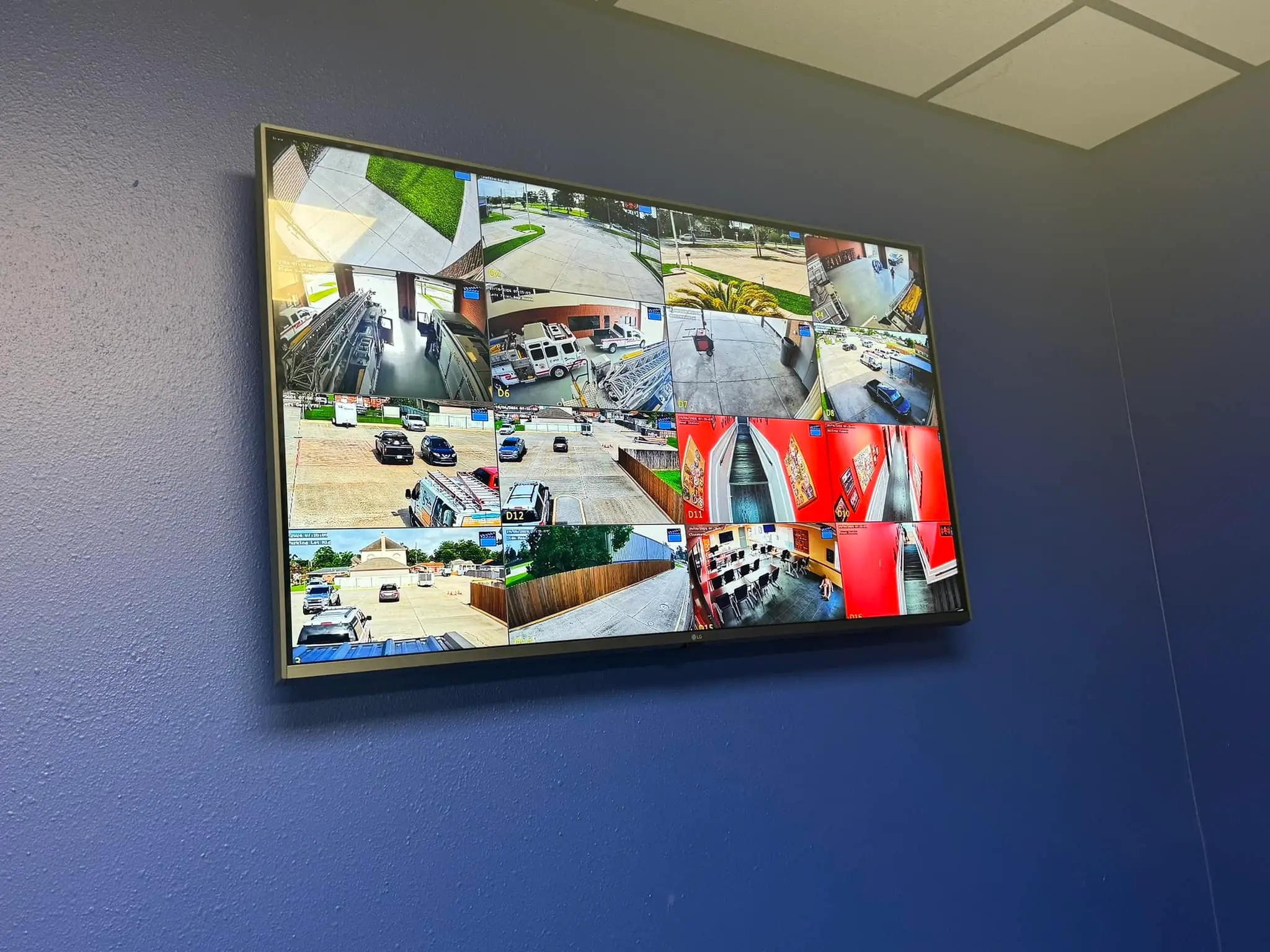 Commercial cameras, screen, or rack on the Westbank: interior wide photo, blue light, brighter toward the top.