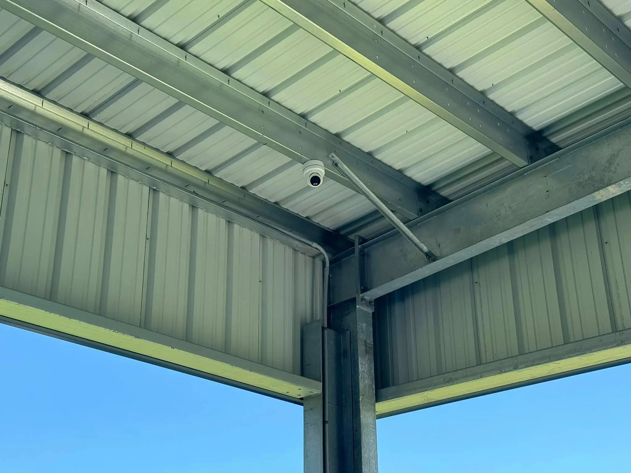 Commercial cameras, screen, or rack on the Westbank: interior wide photo, even light across the frame.