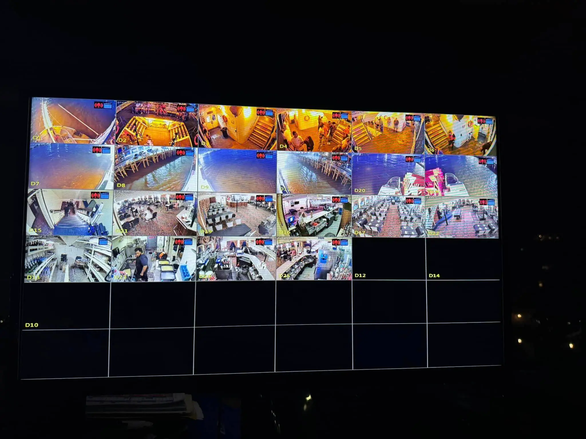Commercial cameras, screen, or rack on the Westbank: night wide photo, brighter toward the top.