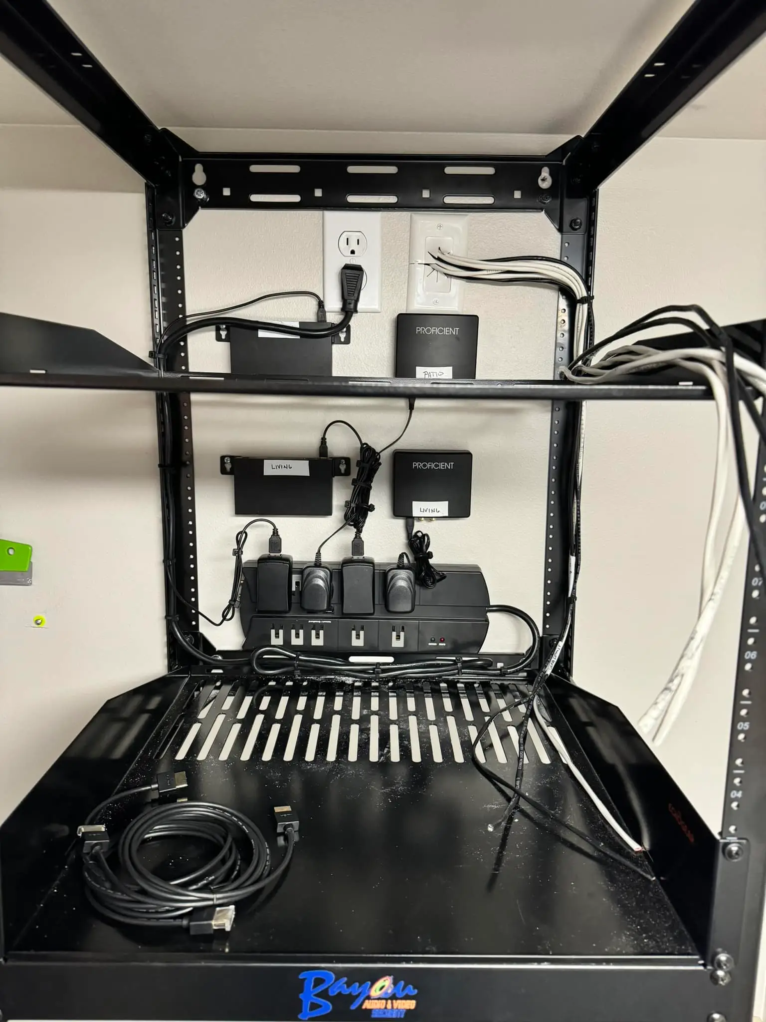 Commercial cameras, screen, or rack on the Westbank: interior tall photo, brighter toward the top.