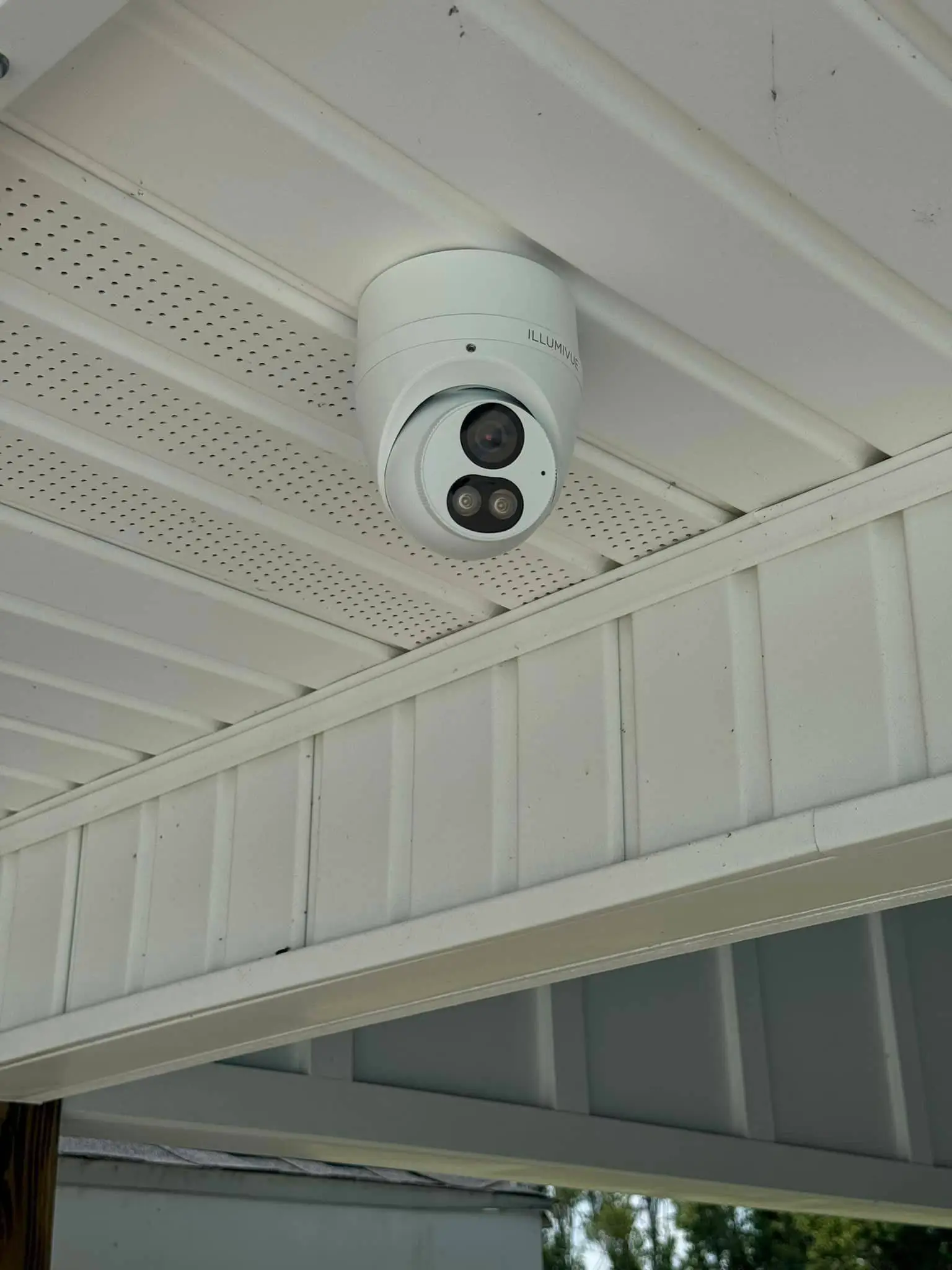 Residential alarm, camera, or AV gear on the Westbank: interior tall photo, brighter toward the top.