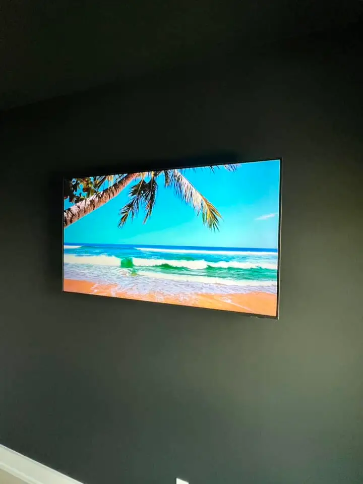 Home theater screen or rack on the Westbank: interior tall photo, brighter toward the bottom.