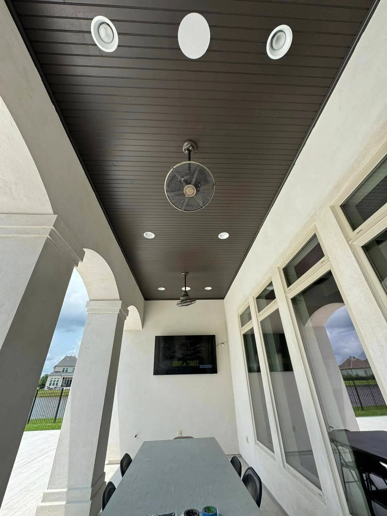 Whole-home speaker, screen, or rack on the Westbank: interior tall photo, brighter toward the bottom.