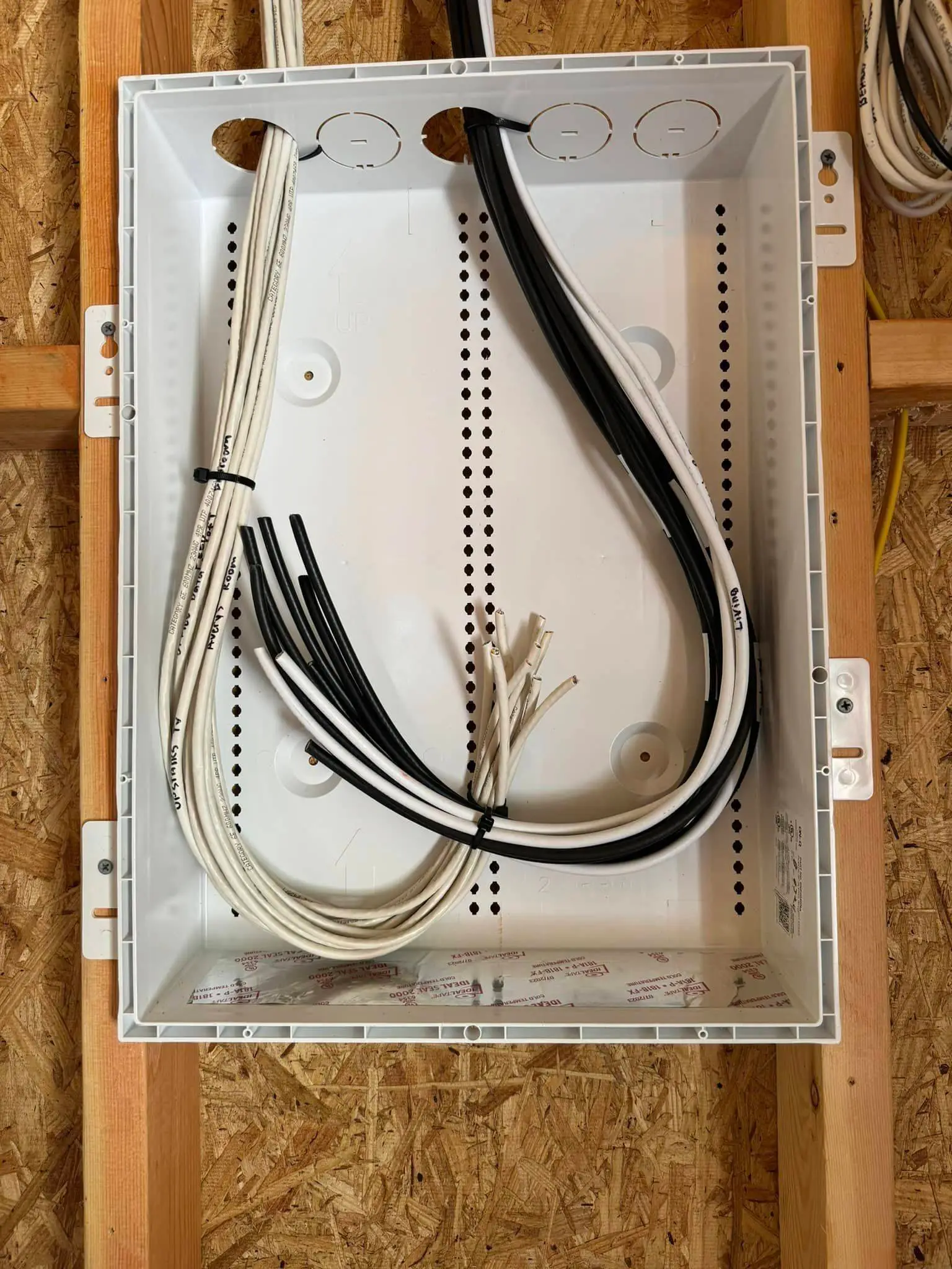 Whole-home speaker, screen, or rack on the Westbank: interior tall photo, red light, brighter toward the top.
