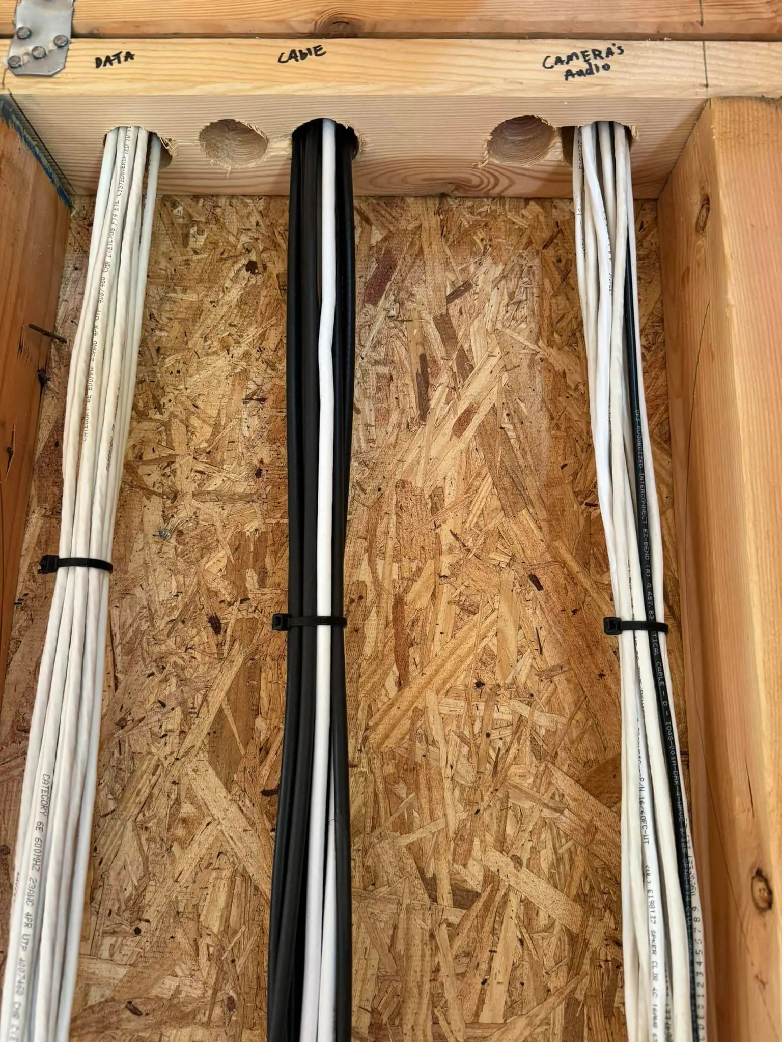 Whole-home speaker, screen, or rack on the Westbank: interior tall photo, red light, even light across the frame.
