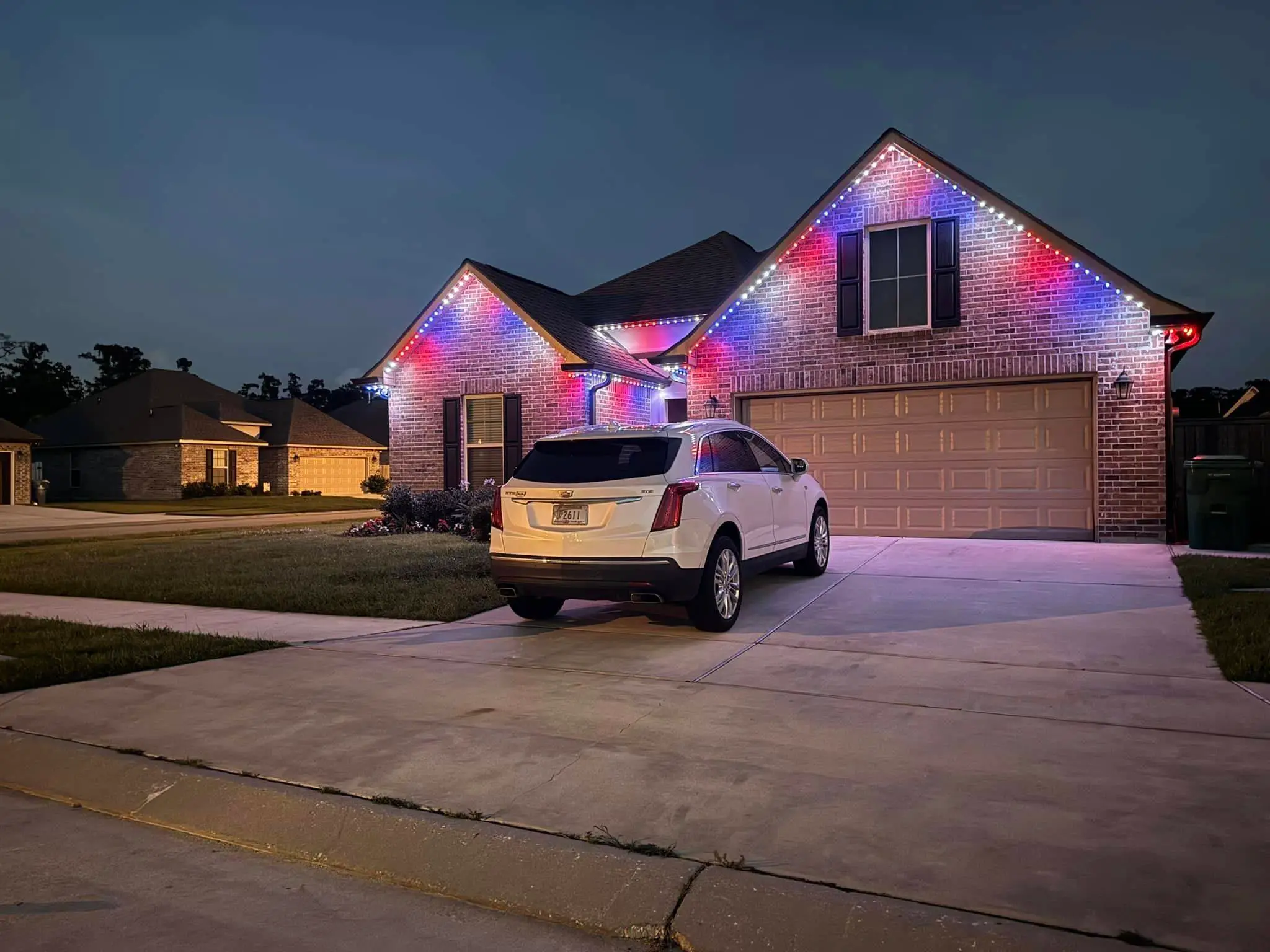 Trimlight on a Westbank house: interior wide photo, even light across the frame.