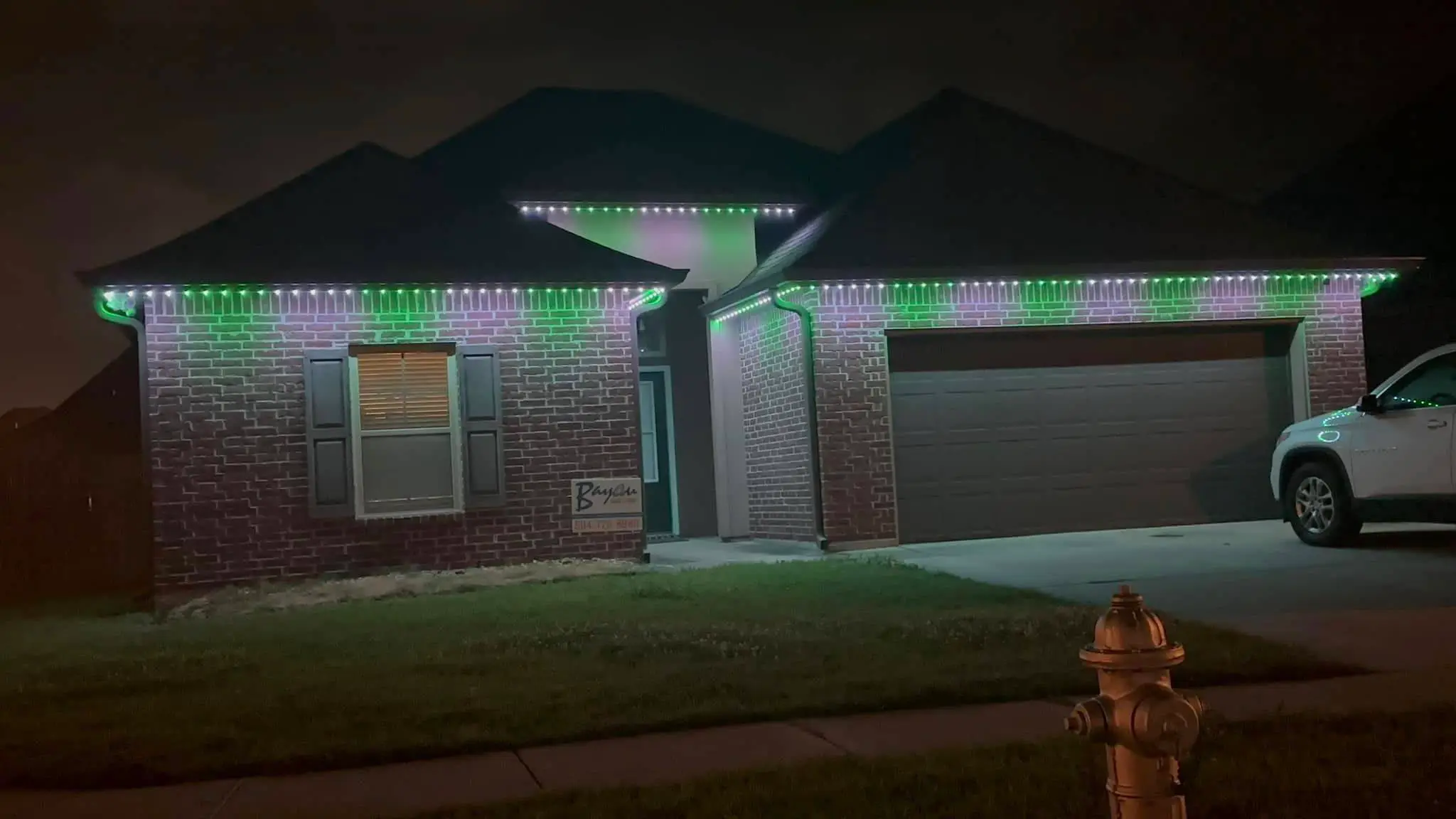 Trimlight on a Westbank house: night wide photo, even light across the frame, photo 9.