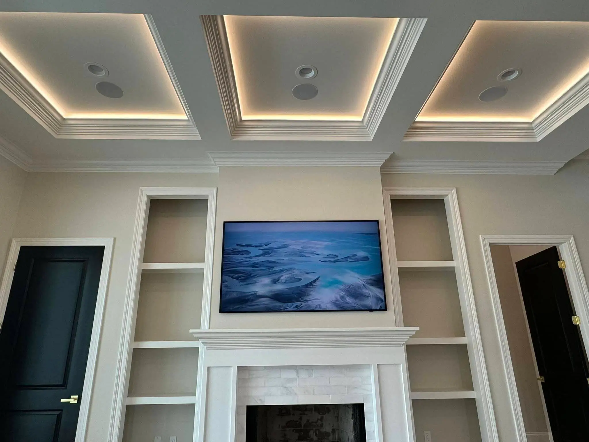 Under-cabinet lights in a Westbank kitchen: interior wide photo, even light across the frame.