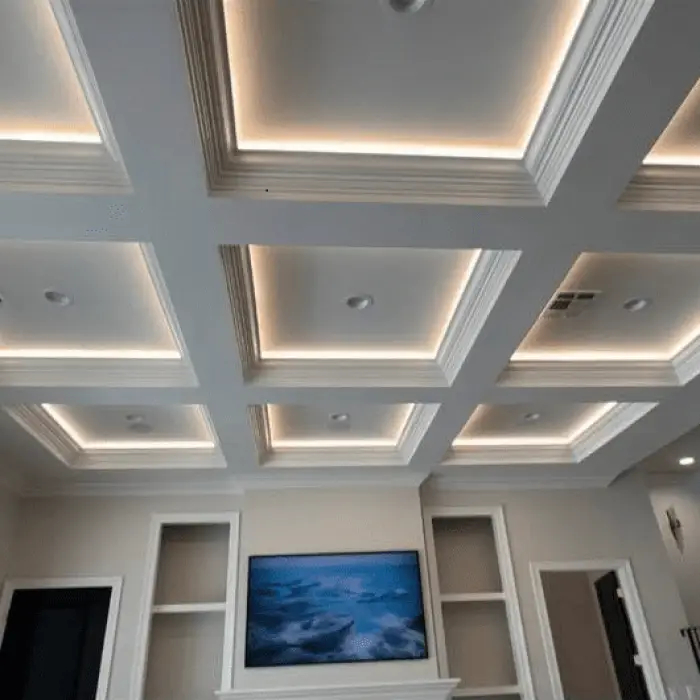 Under-cabinet lights in a Westbank kitchen: interior square photo, brighter toward the top.