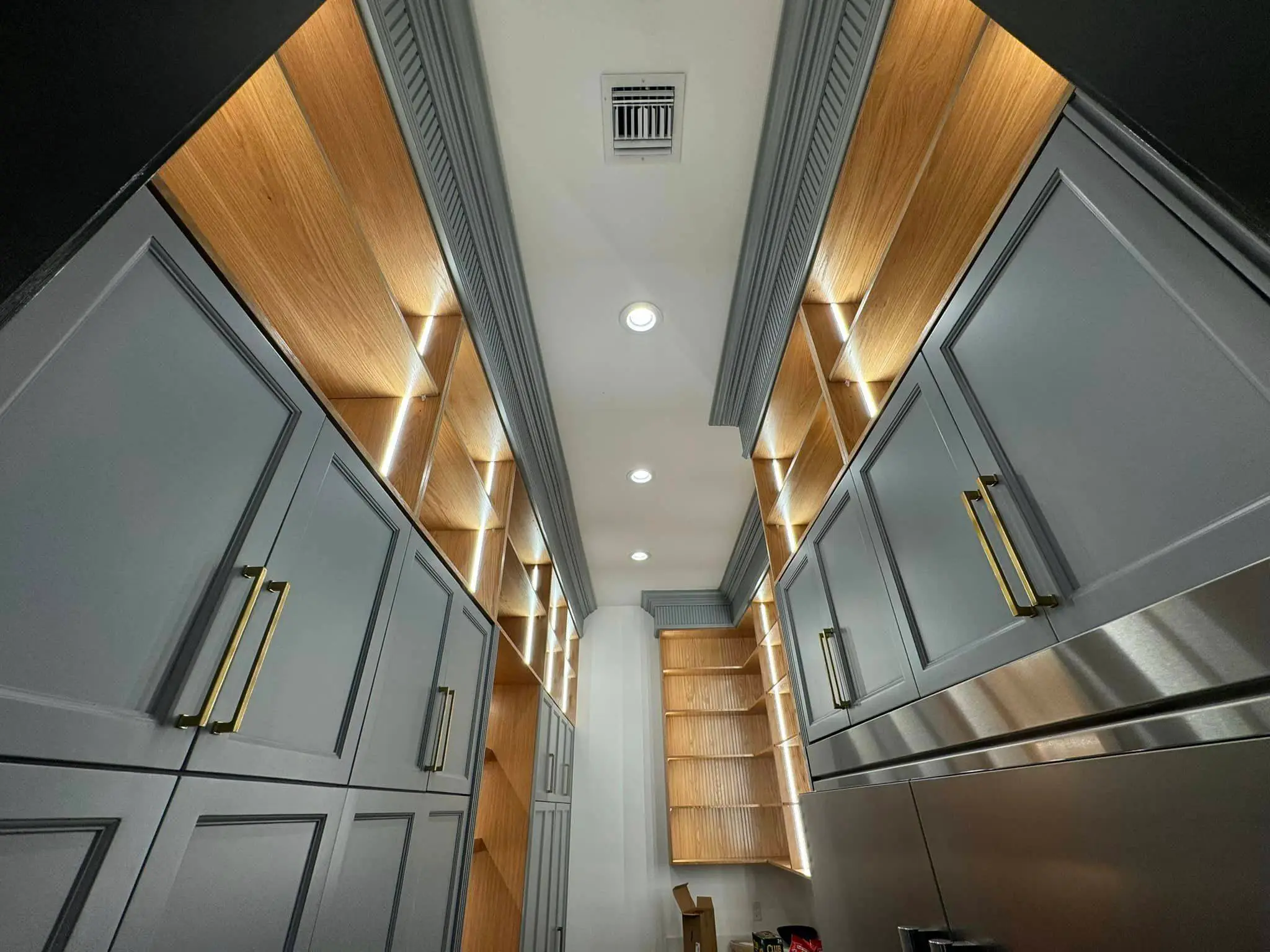 Under-cabinet lights in a Westbank kitchen: interior wide photo, even light across the frame, photo 3.