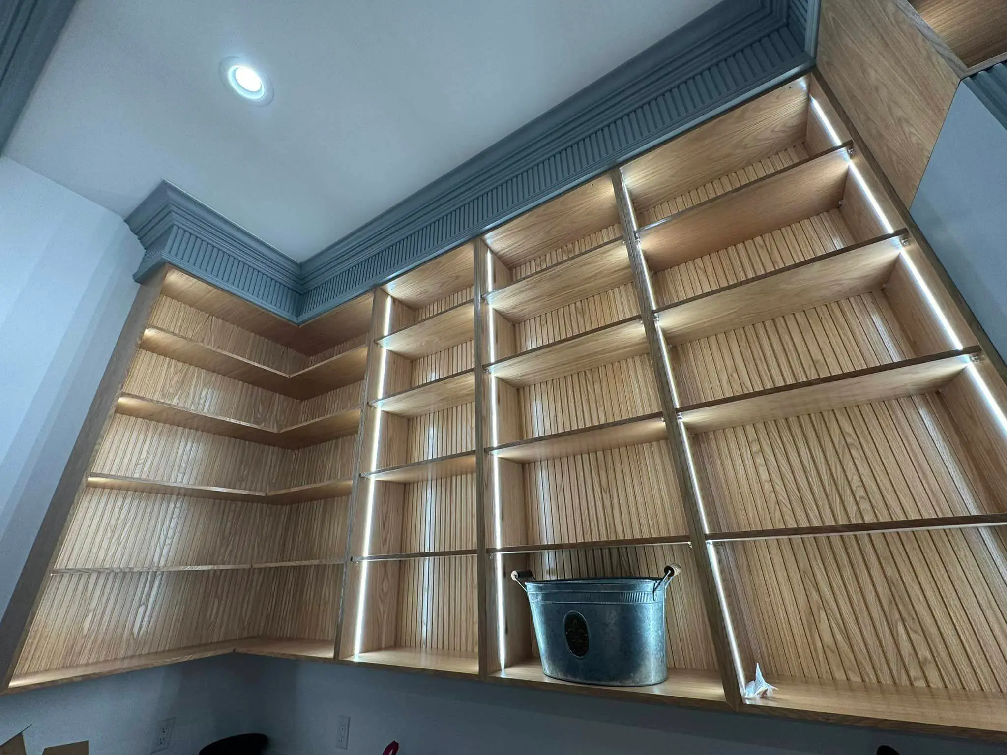 Under-cabinet lights in a Westbank kitchen: interior wide photo, brighter toward the top, photo 8.